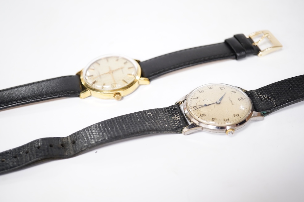 A gentleman's steel and gold plated Longines Conquest manual wind wrist watch, with baton numerals and date aperture, case diameter 35mm, together with a gentleman's stainless steel Marvin manual wind wrist watch, case d
